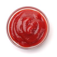 Bowl of  tomato sauce isolated on white
